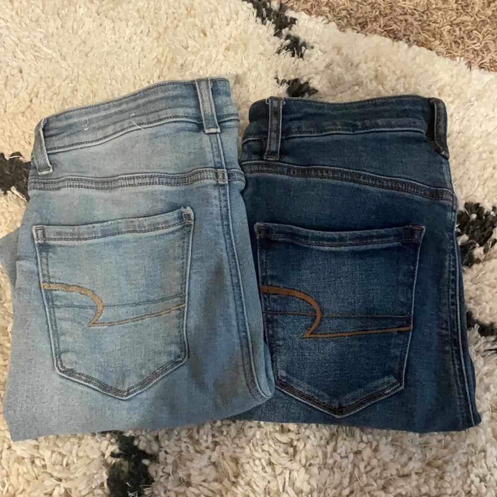 2 pairs of american eagle skinny jeans